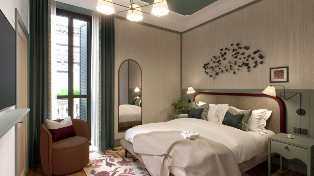 Camera elegante sui toni del verde con letto matrimoniale, poltrona e balcone