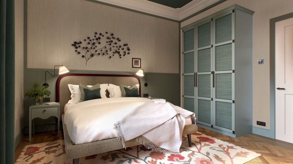 Camera elegante sui toni del verde con letto matrimoniale, poltrona