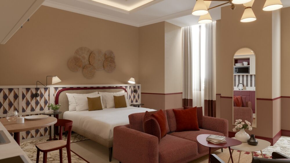 Camera e area living con letto matrimoniale, divano elegante e arredi di design con colori che richiamano la pietra veronese