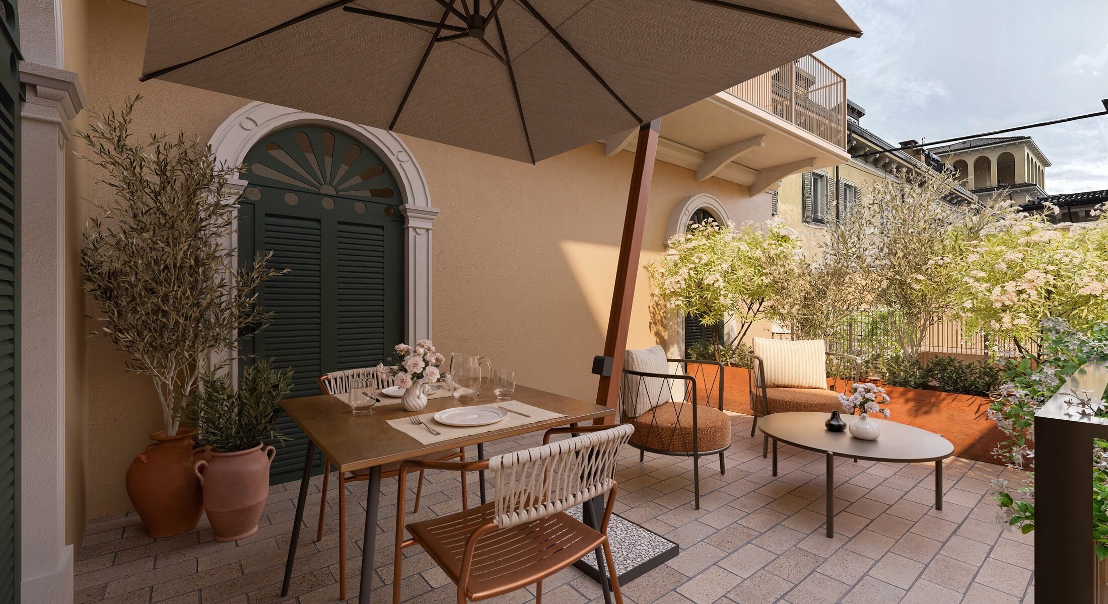 Terrazza dell'appartamento con tavolini