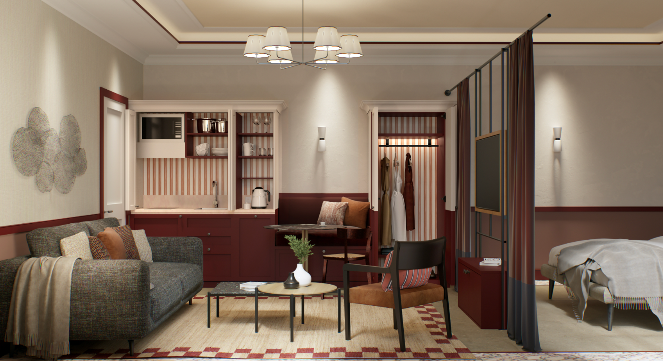 Elegante monolocale con area living, angolo cottura attrezzato e zona notte separata da una tenda