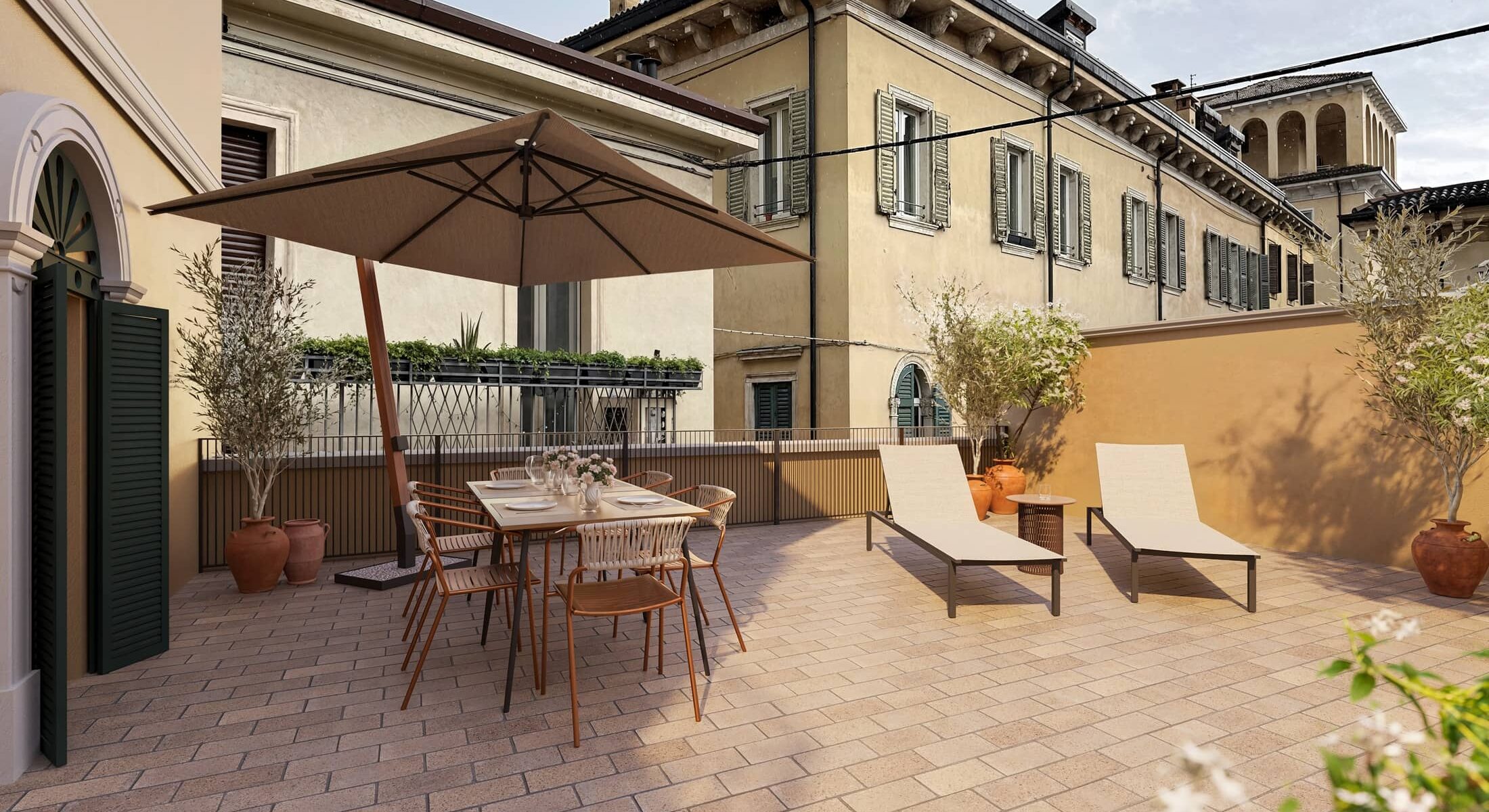 Terrazza arredata con tavolo e sedie – Homy Livia Verona